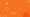 Image of orange background with white pixelated shapes.